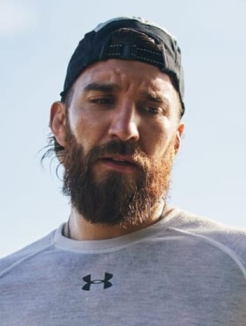 bearded man in under armour clothing