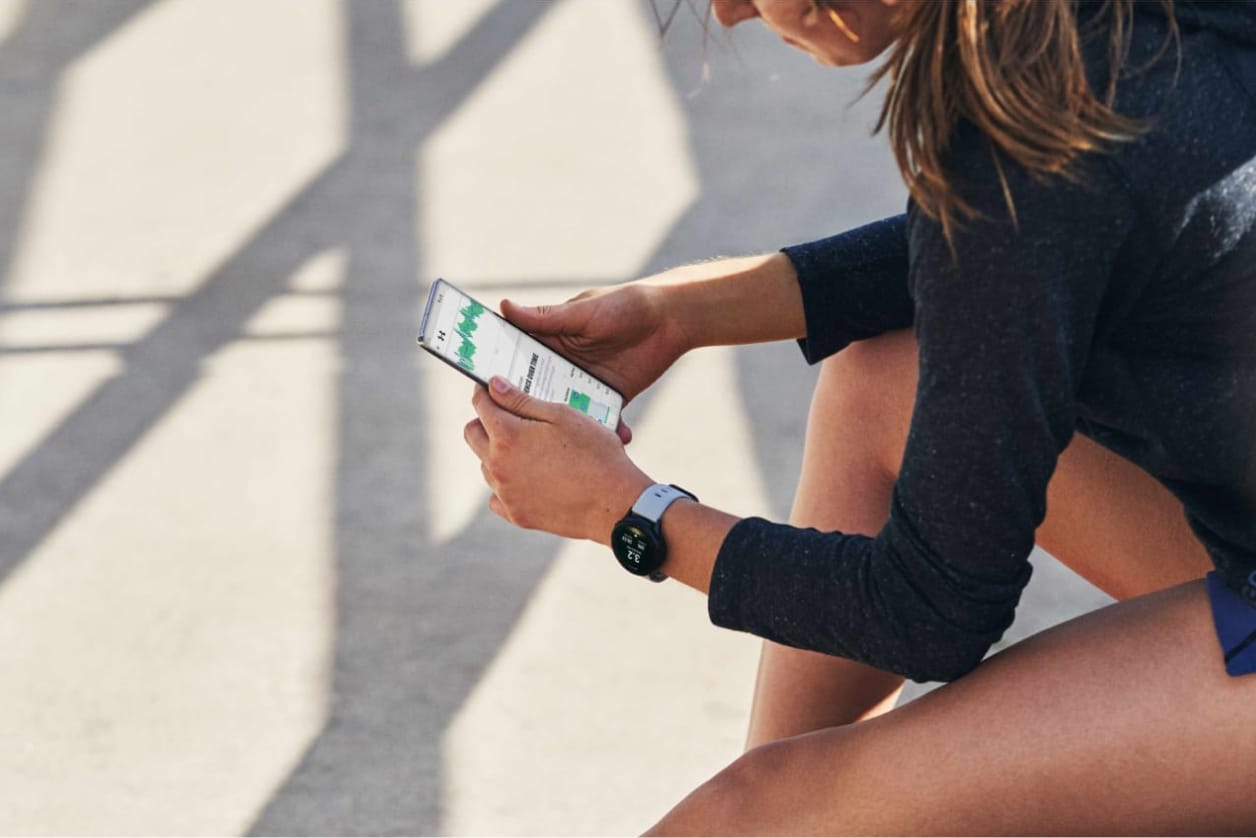 a runner checking under armour app