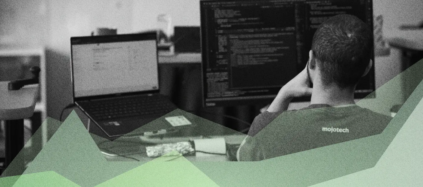 MojoTech engineer working at a computer